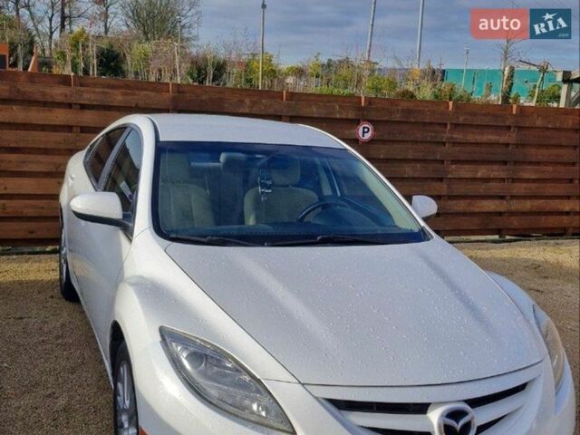 Белый Мазда 6, объемом двигателя 2.49 л и пробегом 143 тыс. км за 7000 $, фото 1 на Automoto.ua