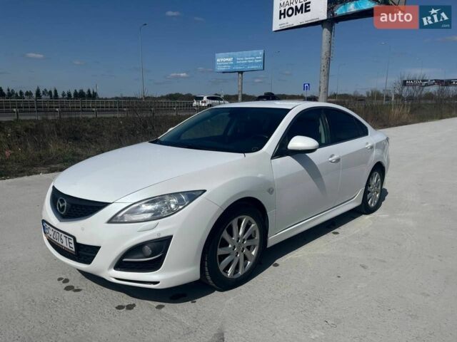 Белый Мазда 6, объемом двигателя 2 л и пробегом 253 тыс. км за 6000 $, фото 1 на Automoto.ua