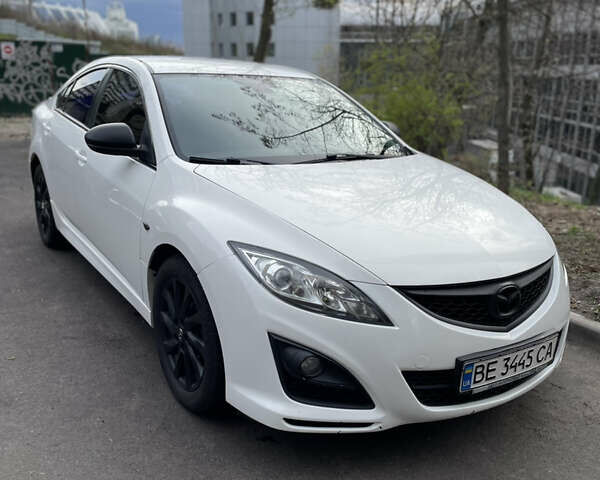 Белый Мазда 6, объемом двигателя 2 л и пробегом 320 тыс. км за 8400 $, фото 1 на Automoto.ua