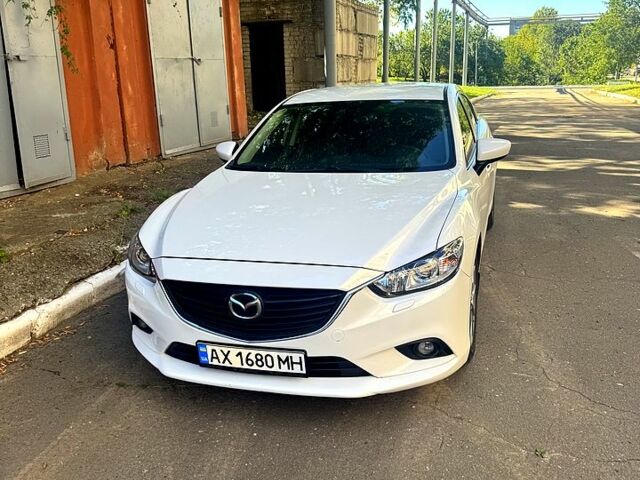 Белый Мазда 6, объемом двигателя 2 л и пробегом 230 тыс. км за 12000 $, фото 1 на Automoto.ua