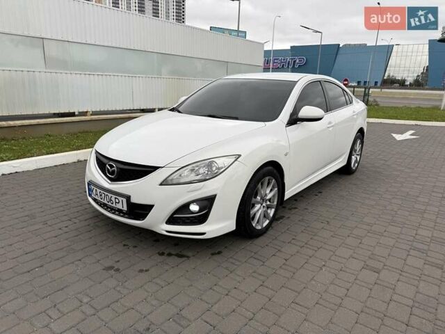 Белый Мазда 6, объемом двигателя 2 л и пробегом 234 тыс. км за 8900 $, фото 1 на Automoto.ua