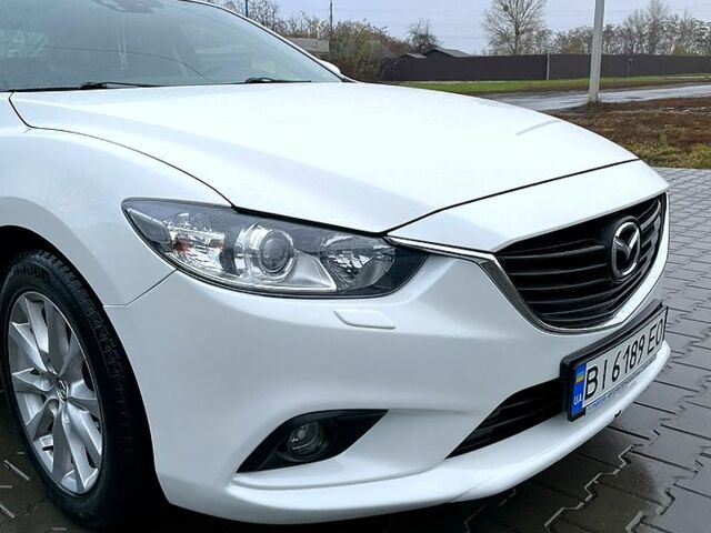 Белый Мазда 6, объемом двигателя 2 л и пробегом 127 тыс. км за 11000 $, фото 1 на Automoto.ua