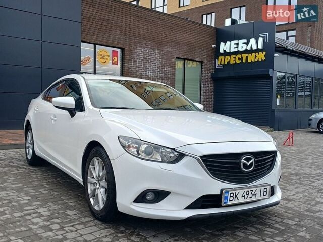 Білий Мазда 6, об'ємом двигуна 2 л та пробігом 258 тис. км за 8999 $, фото 1 на Automoto.ua