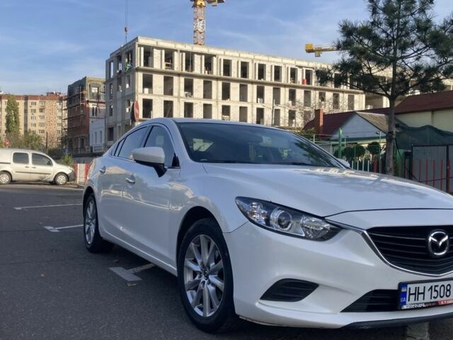 Белый Мазда 6, объемом двигателя 2.5 л и пробегом 200 тыс. км за 12500 $, фото 1 на Automoto.ua