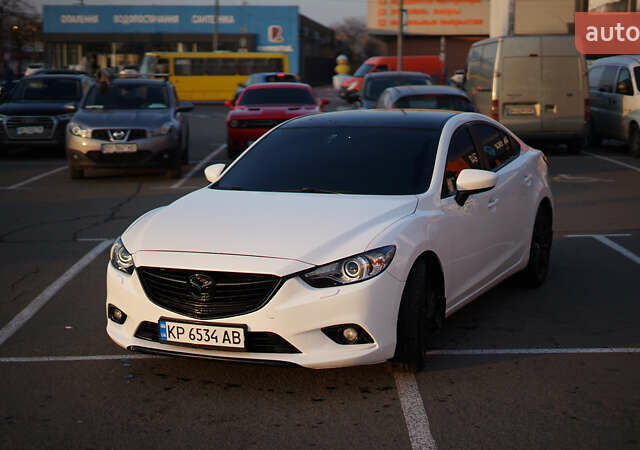Белый Мазда 6, объемом двигателя 2 л и пробегом 190 тыс. км за 11650 $, фото 1 на Automoto.ua