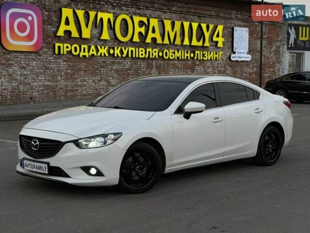Белый Мазда 6, объемом двигателя 2 л и пробегом 199 тыс. км за 9299 $, фото 1 на Automoto.ua