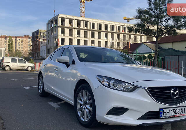 Белый Мазда 6, объемом двигателя 2.49 л и пробегом 200 тыс. км за 11800 $, фото 1 на Automoto.ua