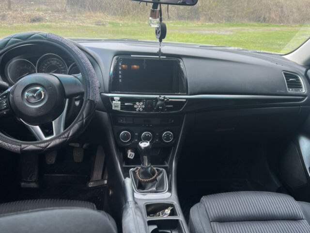Белый Мазда 6, объемом двигателя 2 л и пробегом 210 тыс. км за 10799 $, фото 1 на Automoto.ua