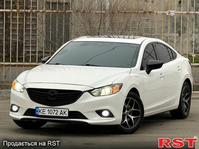 Белый Мазда 6, объемом двигателя 2.5 л и пробегом 230 тыс. км за 6999 $, фото 1 на Automoto.ua