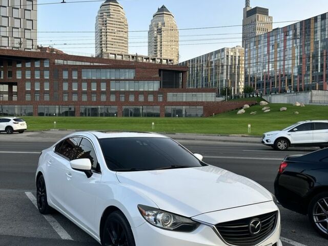Белый Мазда 6, объемом двигателя 2.5 л и пробегом 200 тыс. км за 11700 $, фото 1 на Automoto.ua
