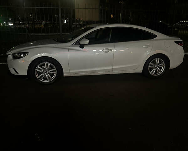 Белый Мазда 6, объемом двигателя 2.5 л и пробегом 167 тыс. км за 11600 $, фото 1 на Automoto.ua