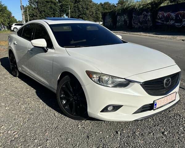 Белый Мазда 6, объемом двигателя 2.5 л и пробегом 230 тыс. км за 11000 $, фото 1 на Automoto.ua
