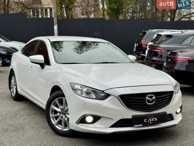 Белый Мазда 6, объемом двигателя 2 л и пробегом 171 тыс. км за 10900 $, фото 1 на Automoto.ua