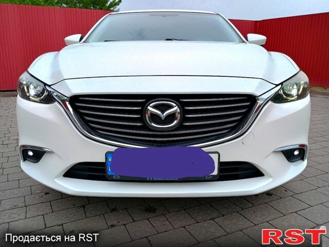 Белый Мазда 6, объемом двигателя 2.5 л и пробегом 151 тыс. км за 13500 $, фото 1 на Automoto.ua