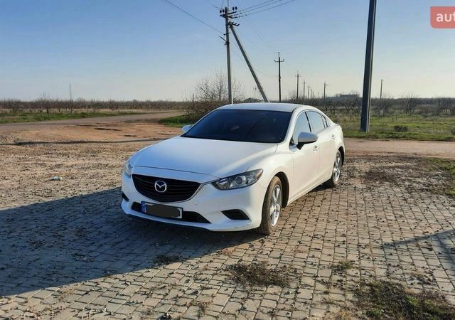 Белый Мазда 6, объемом двигателя 2.49 л и пробегом 143 тыс. км за 9999 $, фото 1 на Automoto.ua