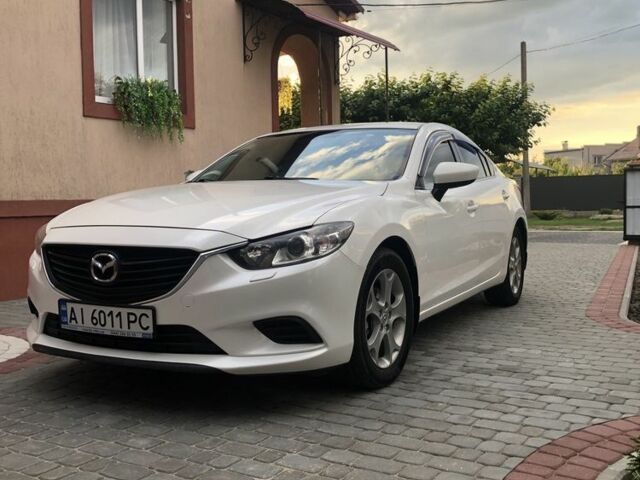 Білий Мазда 6, об'ємом двигуна 2 л та пробігом 135 тис. км за 12895 $, фото 1 на Automoto.ua