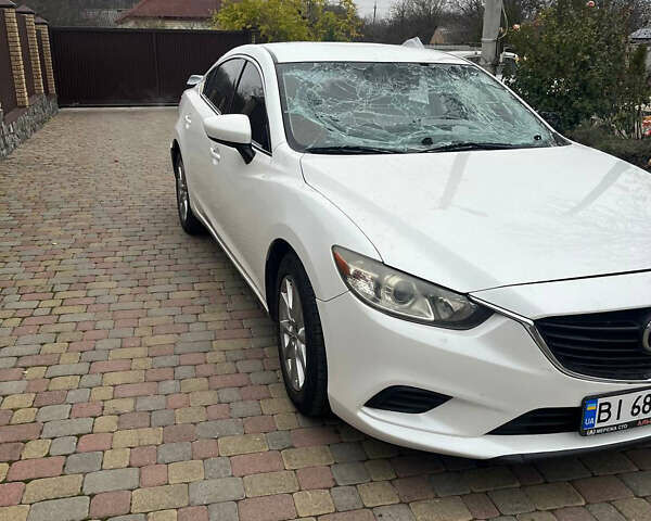 Белый Мазда 6, объемом двигателя 2.49 л и пробегом 190 тыс. км за 6850 $, фото 1 на Automoto.ua