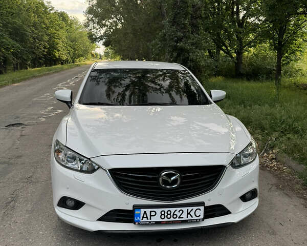 Белый Мазда 6, объемом двигателя 2.49 л и пробегом 157 тыс. км за 11500 $, фото 1 на Automoto.ua