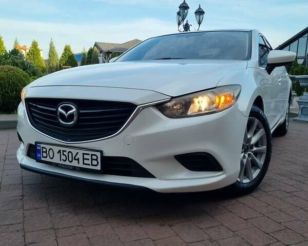 Белый Мазда 6, объемом двигателя 2.49 л и пробегом 205 тыс. км за 9500 $, фото 1 на Automoto.ua