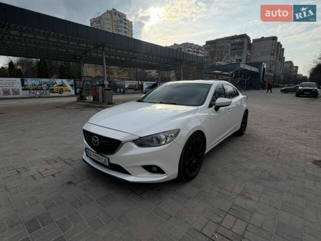 Белый Мазда 6, объемом двигателя 2.49 л и пробегом 177 тыс. км за 11600 $, фото 1 на Automoto.ua
