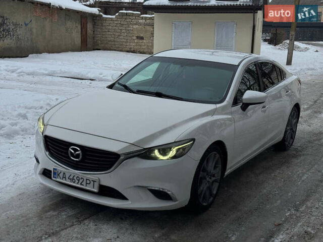 Белый Мазда 6, объемом двигателя 2.5 л и пробегом 170 тыс. км за 11000 $, фото 1 на Automoto.ua