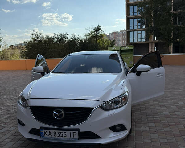 Белый Мазда 6, объемом двигателя 2 л и пробегом 140 тыс. км за 13000 $, фото 1 на Automoto.ua