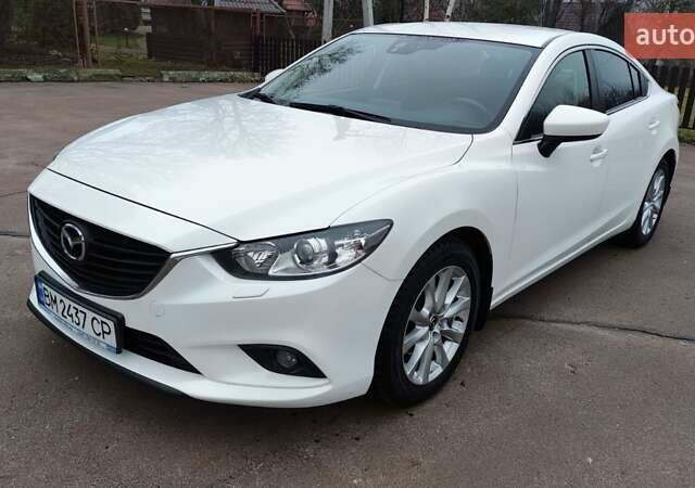 Белый Мазда 6, объемом двигателя 2 л и пробегом 170 тыс. км за 14800 $, фото 1 на Automoto.ua