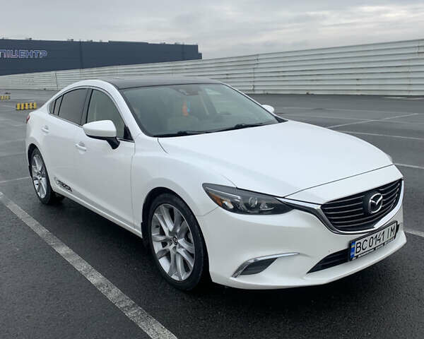 Белый Мазда 6, объемом двигателя 2.49 л и пробегом 107 тыс. км за 11700 $, фото 1 на Automoto.ua
