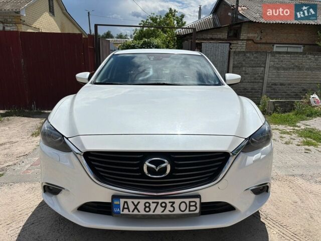 Белый Мазда 6, объемом двигателя 2.19 л и пробегом 210 тыс. км за 13250 $, фото 1 на Automoto.ua