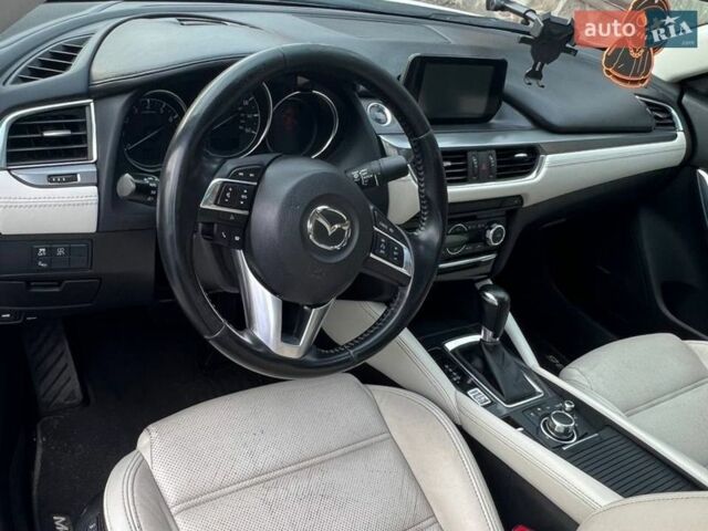 Белый Мазда 6, объемом двигателя 2.49 л и пробегом 189 тыс. км за 14100 $, фото 1 на Automoto.ua