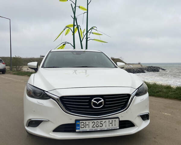 Білий Мазда 6, об'ємом двигуна 2.19 л та пробігом 143 тис. км за 12900 $, фото 1 на Automoto.ua