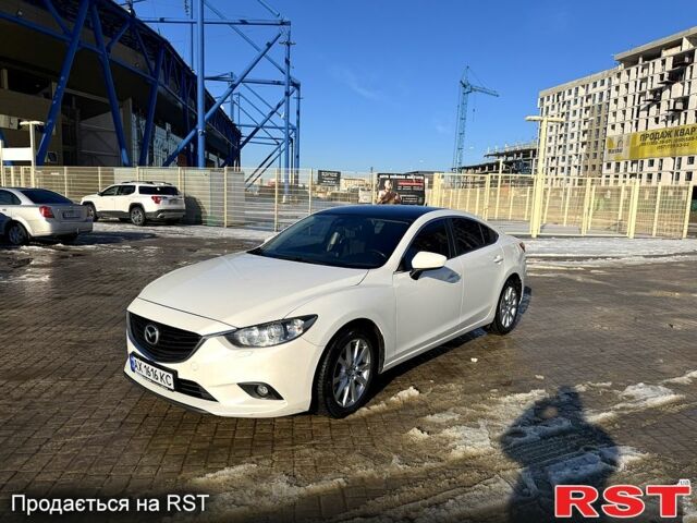 Белый Мазда 6, объемом двигателя 2 л и пробегом 204 тыс. км за 12000 $, фото 1 на Automoto.ua
