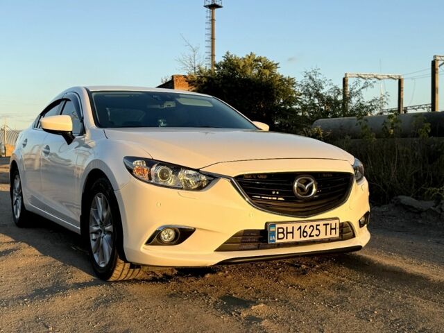Білий Мазда 6, об'ємом двигуна 2 л та пробігом 79 тис. км за 13500 $, фото 1 на Automoto.ua