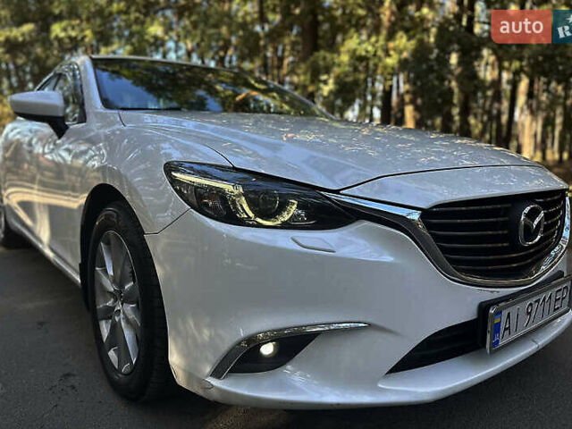 Белый Мазда 6, объемом двигателя 2.19 л и пробегом 146 тыс. км за 15000 $, фото 1 на Automoto.ua