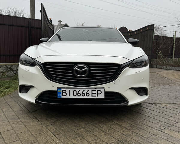Белый Мазда 6, объемом двигателя 2.45 л и пробегом 184 тыс. км за 17500 $, фото 1 на Automoto.ua