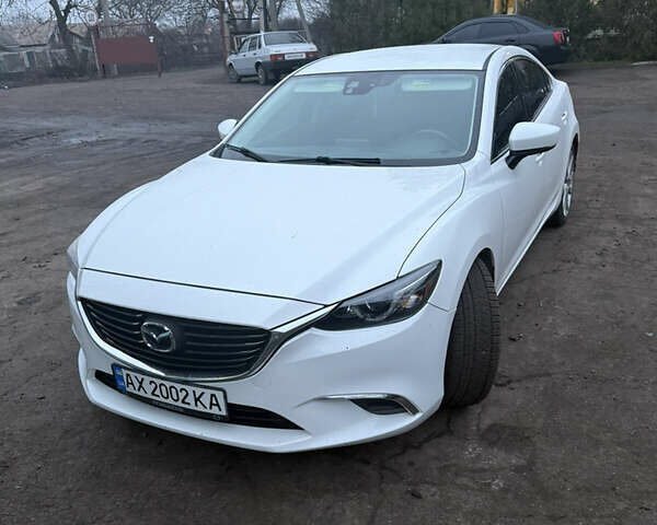 Белый Мазда 6, объемом двигателя 2.49 л и пробегом 105 тыс. км за 12000 $, фото 1 на Automoto.ua