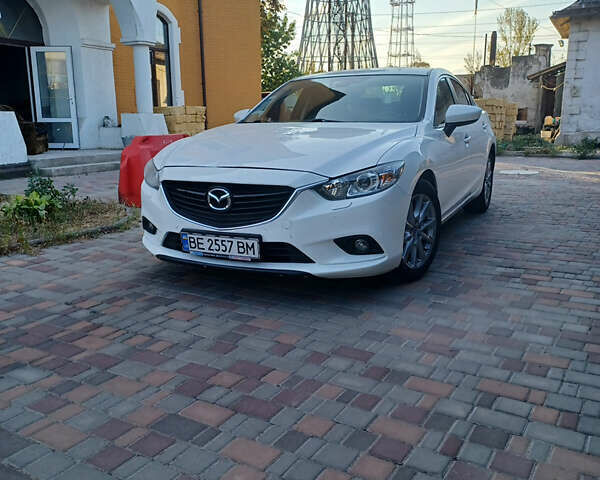 Белый Мазда 6, объемом двигателя 2 л и пробегом 67 тыс. км за 16000 $, фото 1 на Automoto.ua