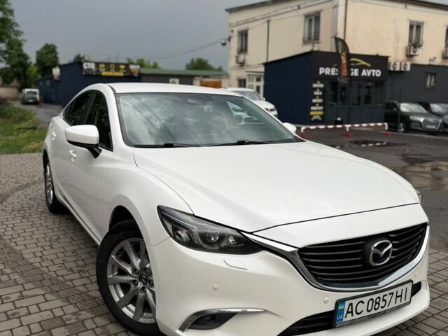 Білий Мазда 6, об'ємом двигуна 2.19 л та пробігом 212 тис. км за 12900 $, фото 1 на Automoto.ua