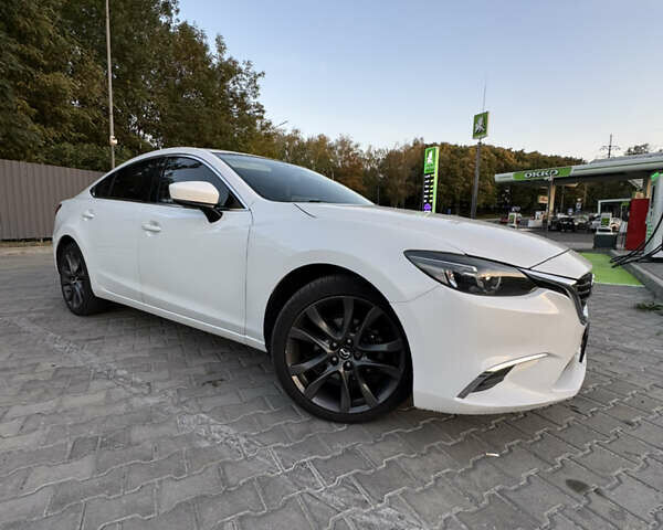 Белый Мазда 6, объемом двигателя 2.49 л и пробегом 138 тыс. км за 13500 $, фото 1 на Automoto.ua