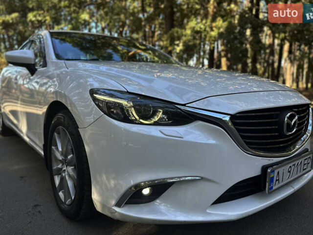 Белый Мазда 6, объемом двигателя 2.19 л и пробегом 146 тыс. км за 15000 $, фото 1 на Automoto.ua