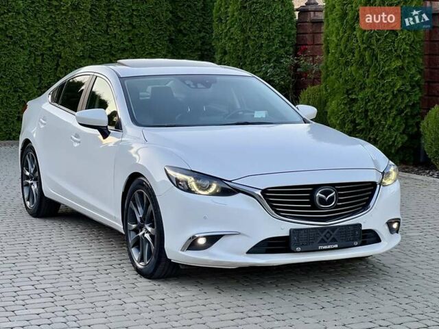 Белый Мазда 6, объемом двигателя 2.49 л и пробегом 130 тыс. км за 17999 $, фото 1 на Automoto.ua