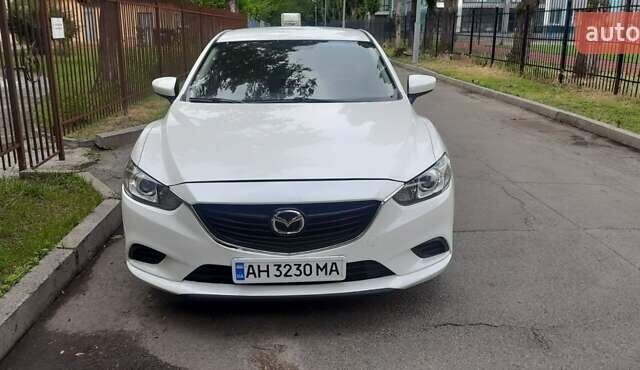 Белый Мазда 6, объемом двигателя 2.49 л и пробегом 75 тыс. км за 14500 $, фото 1 на Automoto.ua