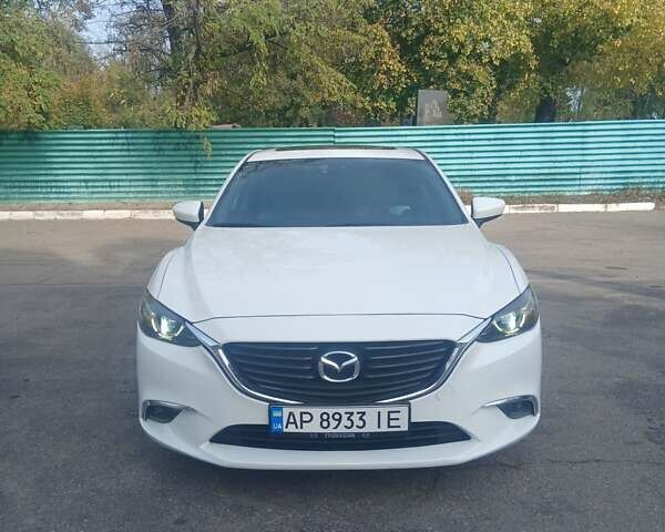 Белый Мазда 6, объемом двигателя 2.49 л и пробегом 124 тыс. км за 15500 $, фото 1 на Automoto.ua