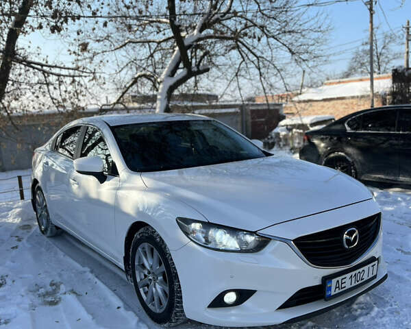 Белый Мазда 6, объемом двигателя 2 л и пробегом 120 тыс. км за 15000 $, фото 1 на Automoto.ua