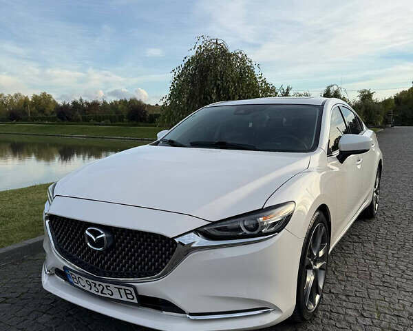 Белый Мазда 6, объемом двигателя 2.49 л и пробегом 158 тыс. км за 15450 $, фото 1 на Automoto.ua