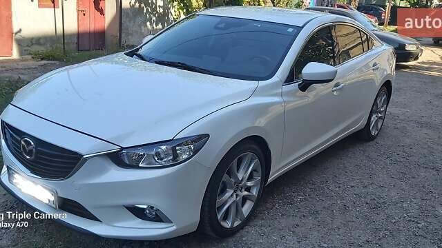 Белый Мазда 6, объемом двигателя 2.5 л и пробегом 72 тыс. км за 17500 $, фото 1 на Automoto.ua
