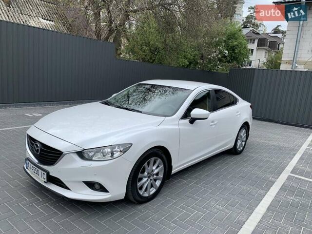 Белый Мазда 6, объемом двигателя 2 л и пробегом 86 тыс. км за 16700 $, фото 1 на Automoto.ua