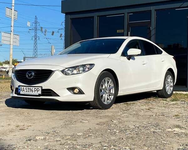 Белый Мазда 6, объемом двигателя 2 л и пробегом 116 тыс. км за 15000 $, фото 1 на Automoto.ua