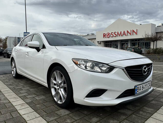 Белый Мазда 6, объемом двигателя 2.5 л и пробегом 127 тыс. км за 16000 $, фото 1 на Automoto.ua