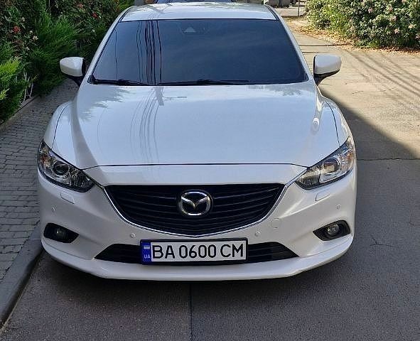 Белый Мазда 6, объемом двигателя 2 л и пробегом 92 тыс. км за 16000 $, фото 1 на Automoto.ua